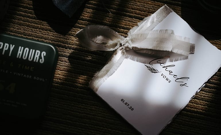 paper with vows on table